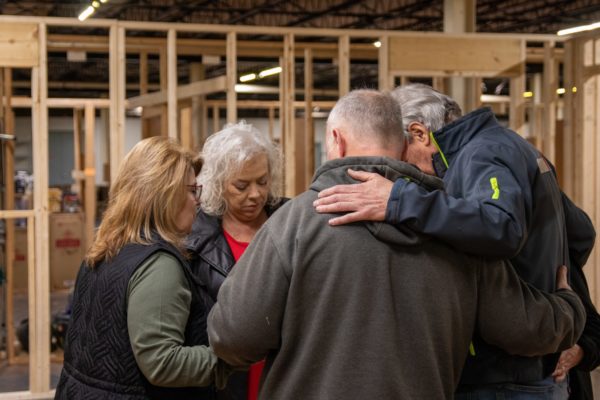 Cathy Gallimore has prayer in her new home, which has been framed in GPC's Upper Warehouse.